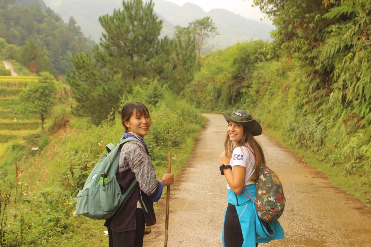 Guide and guest on a village path